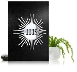 Wycięty symbol IHS na nagrobku