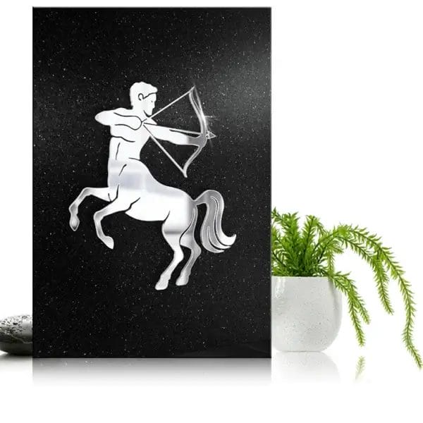 Symbol Strzelca na nagrobku z czarnego granitu